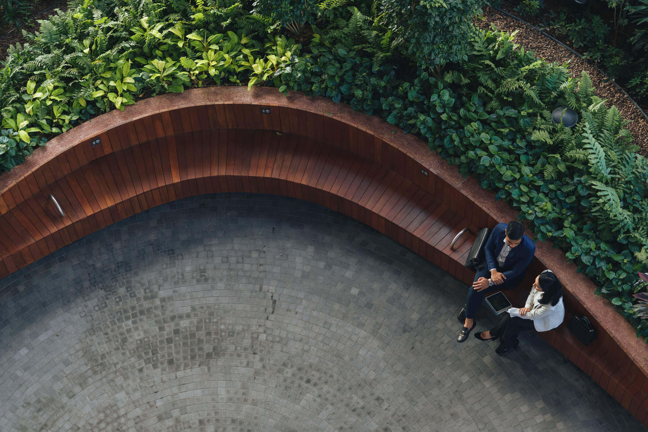 Successful business - Indian man and woman in a thoughtful conversation